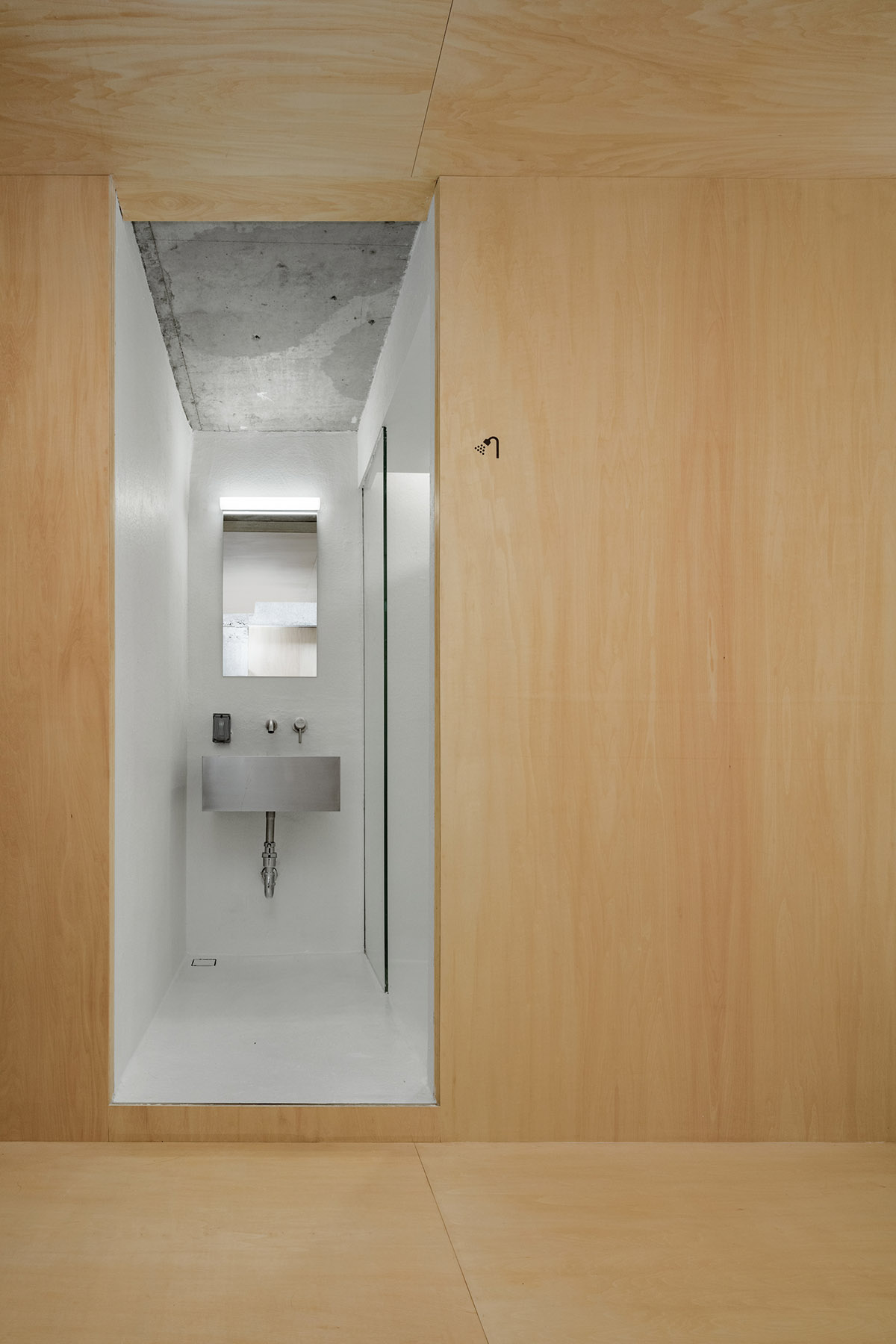 kooo architects designed warm interior space for young travelers for this guesthouse in Guangzhou