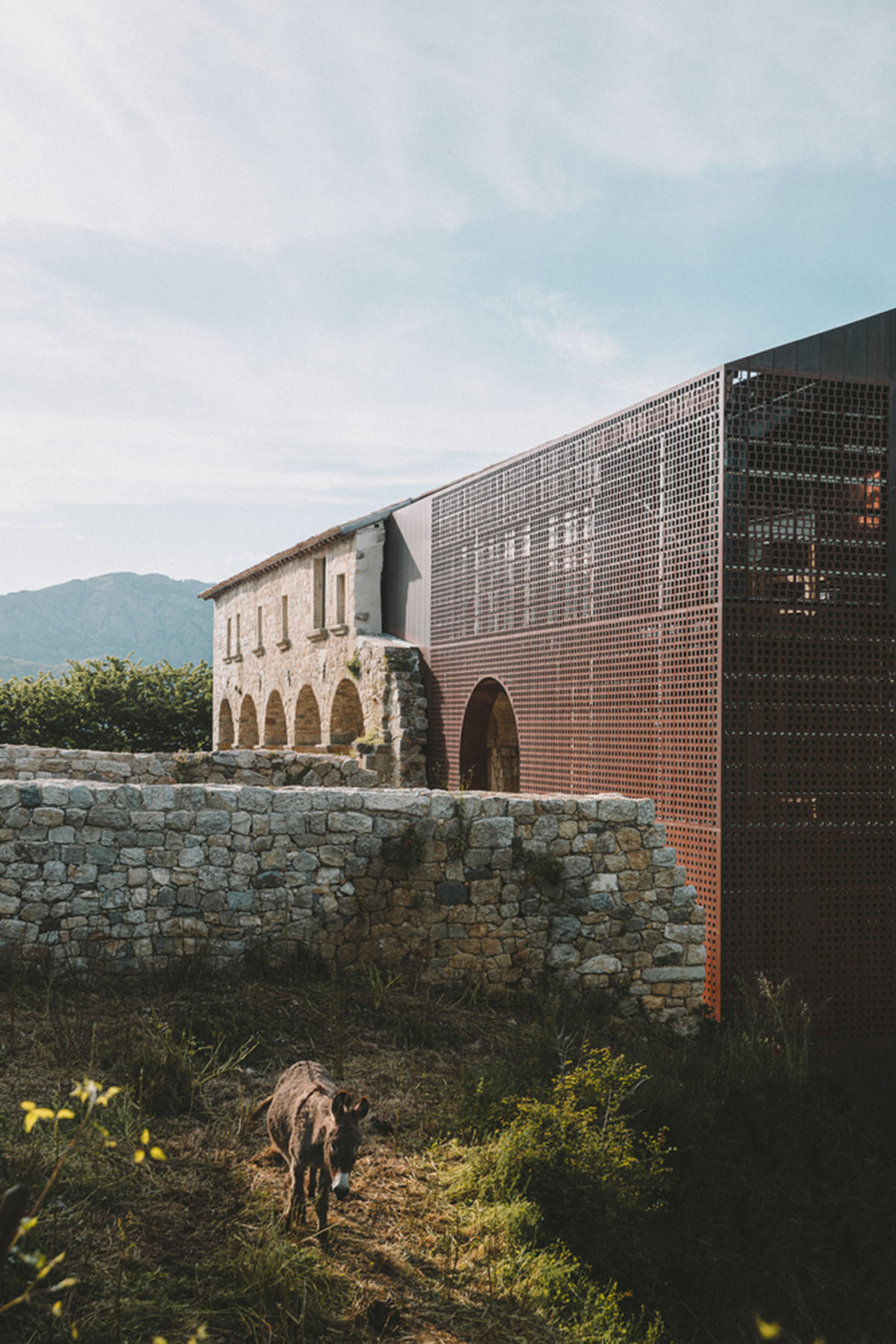 Amelia Tavella Architectes extends historic convent with copper structure in France