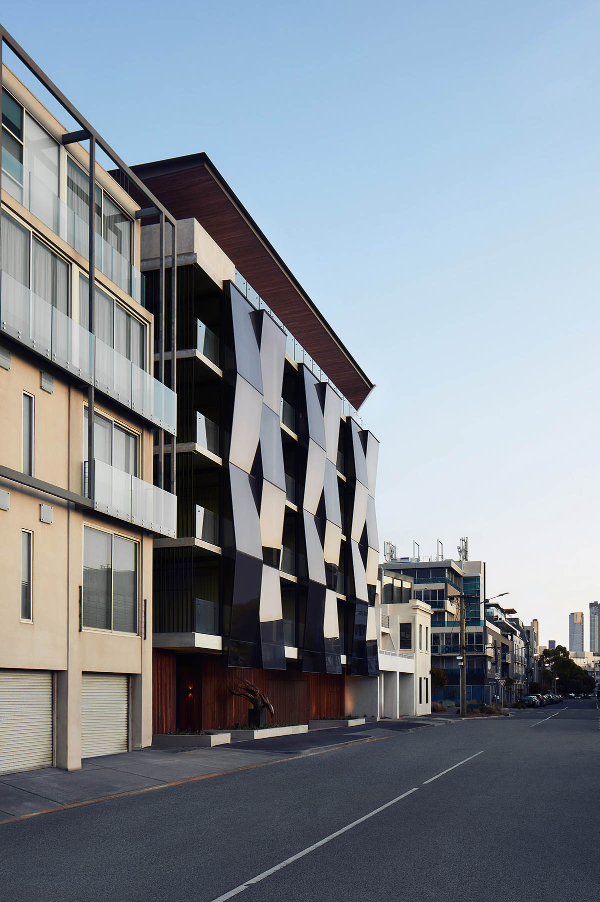 Wood Marsh's Alumuna Residences feature bronze folded mirrored glass in Australia