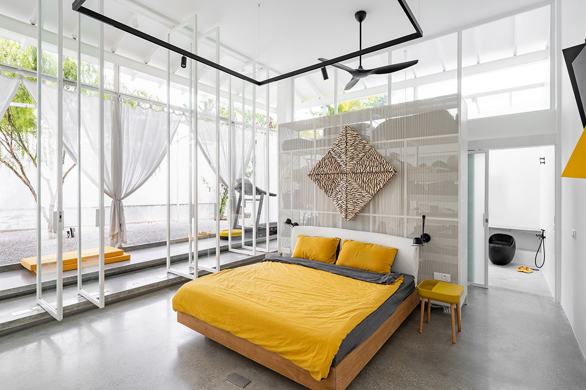 Malaysian home by Core Design Workshop is shaped by artworks and a large inner garden