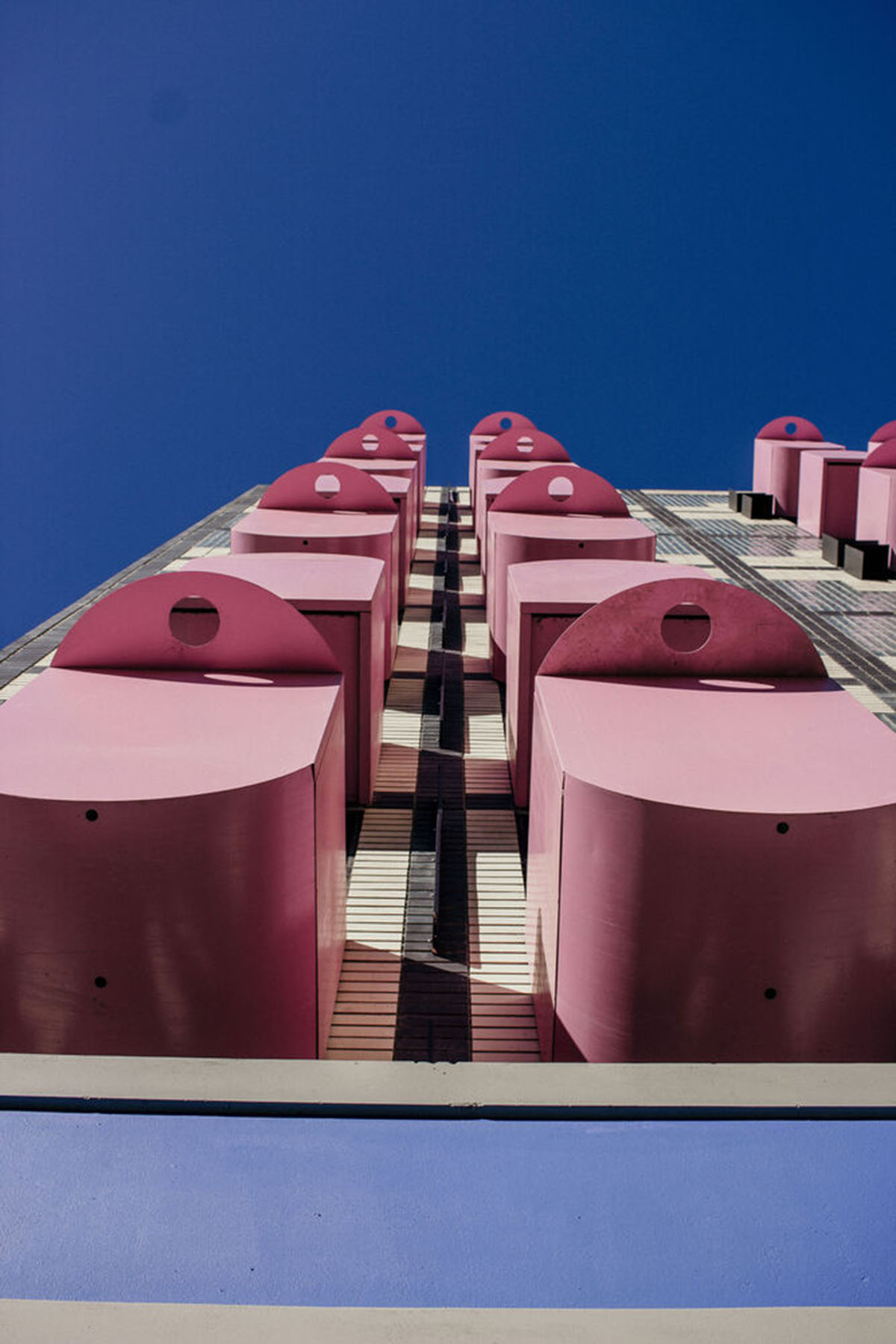 Two Five Five Architects adds protruding bright pink marshmallow balconies to apartment in Cape Town