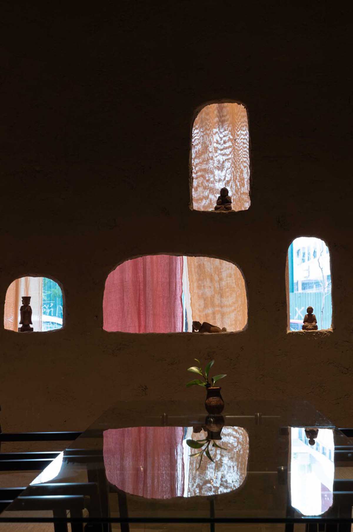 Vegetarian restaurant by Adrei Studio features moulded walls that become exhibition piece in Vietnam 