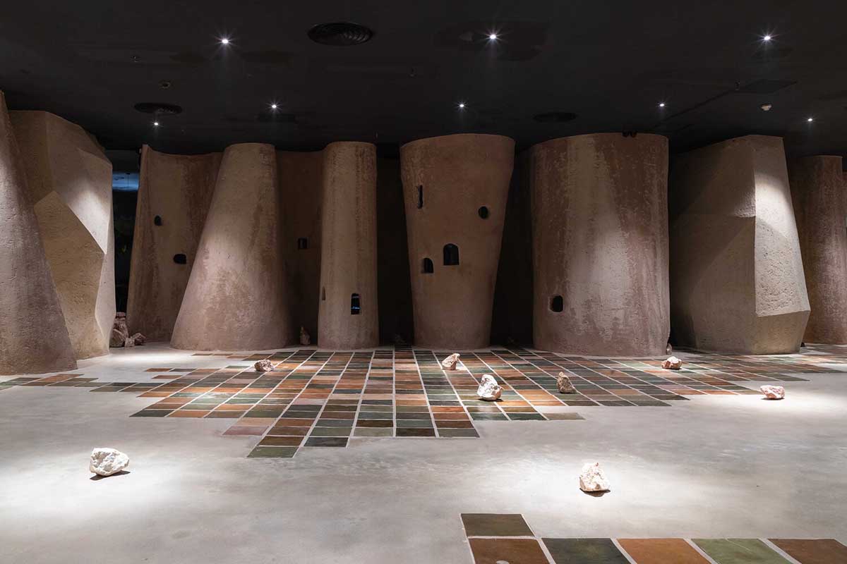 Vegetarian restaurant by Adrei Studio features moulded walls that become exhibition piece in Vietnam 