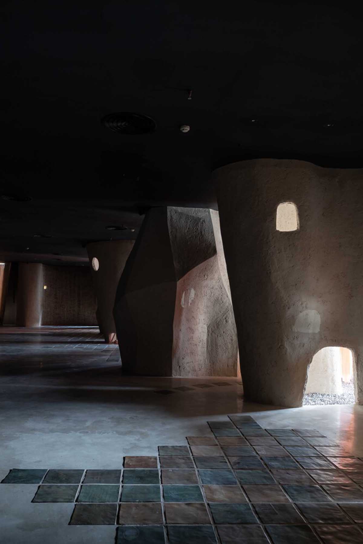 Vegetarian restaurant by Adrei Studio features moulded walls that become exhibition piece in Vietnam 