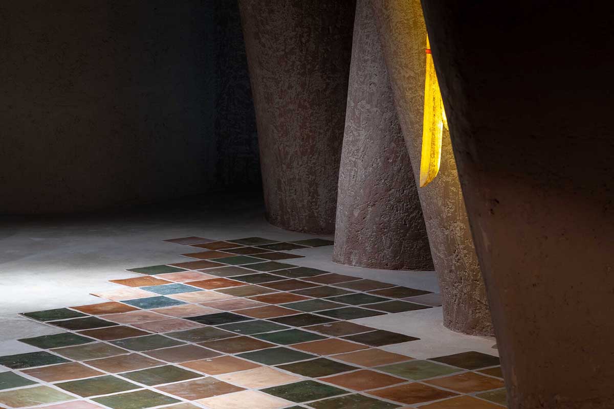 Vegetarian restaurant by Adrei Studio features moulded walls that become exhibition piece in Vietnam 