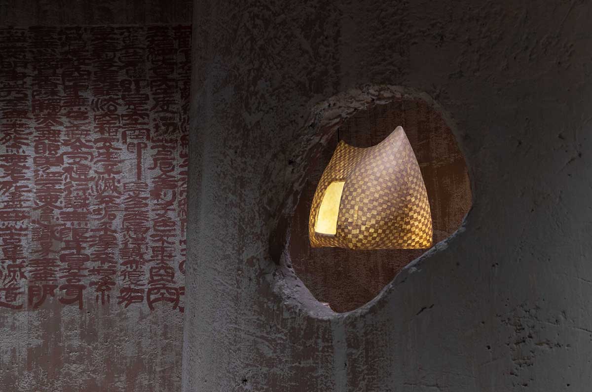 Vegetarian restaurant by Adrei Studio features moulded walls that become exhibition piece in Vietnam 