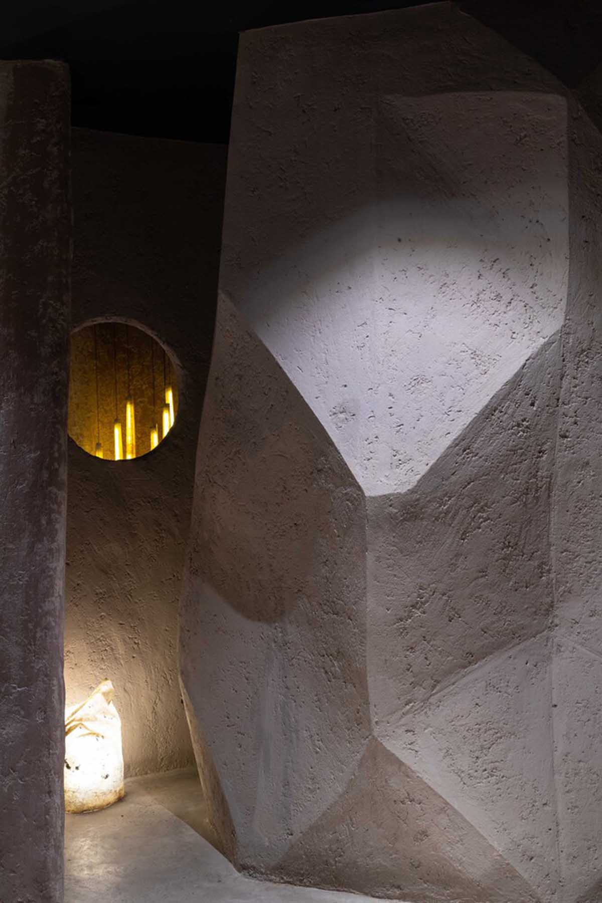 Vegetarian restaurant by Adrei Studio features moulded walls that become exhibition piece in Vietnam 