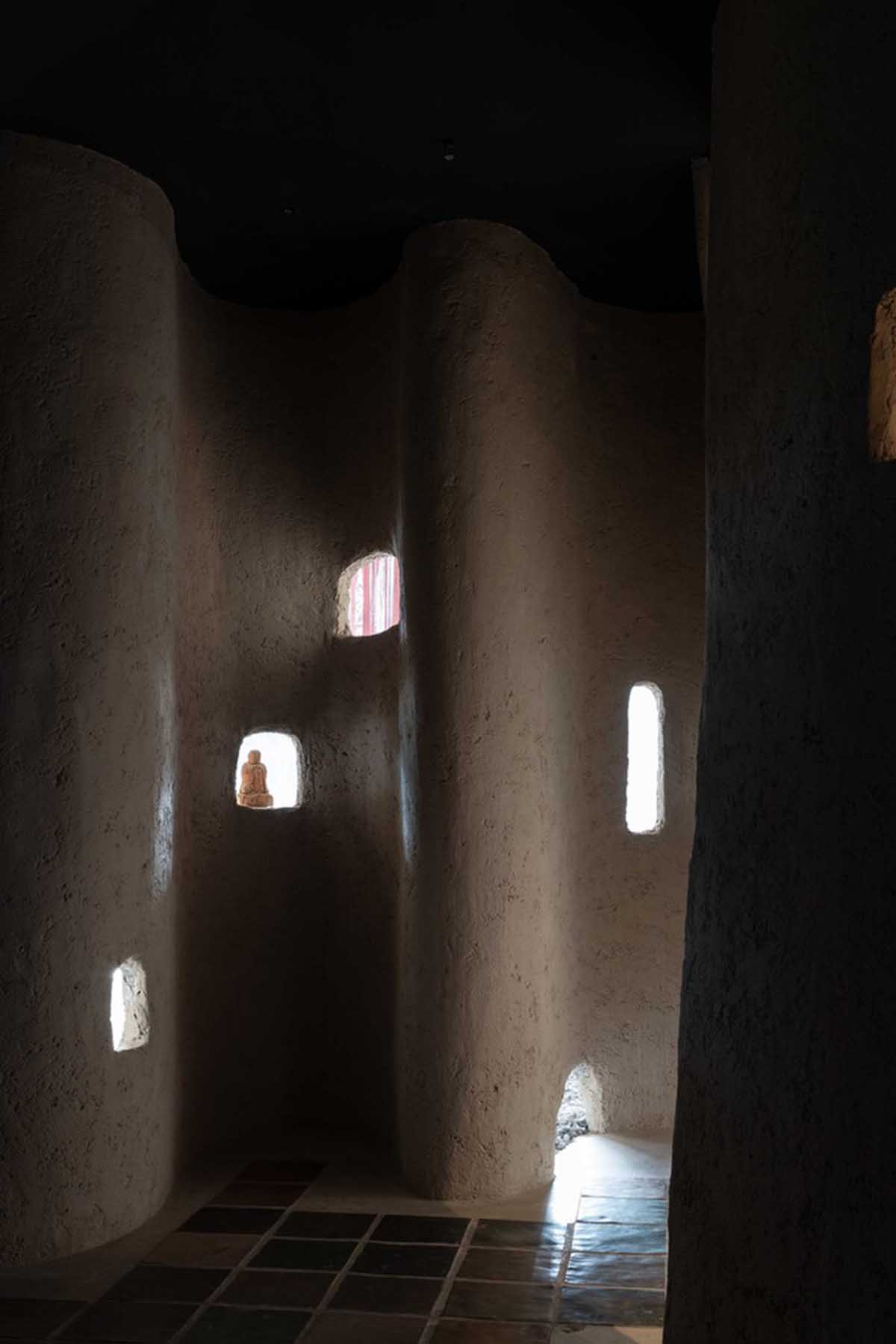 Vegetarian restaurant by Adrei Studio features moulded walls that become exhibition piece in Vietnam 