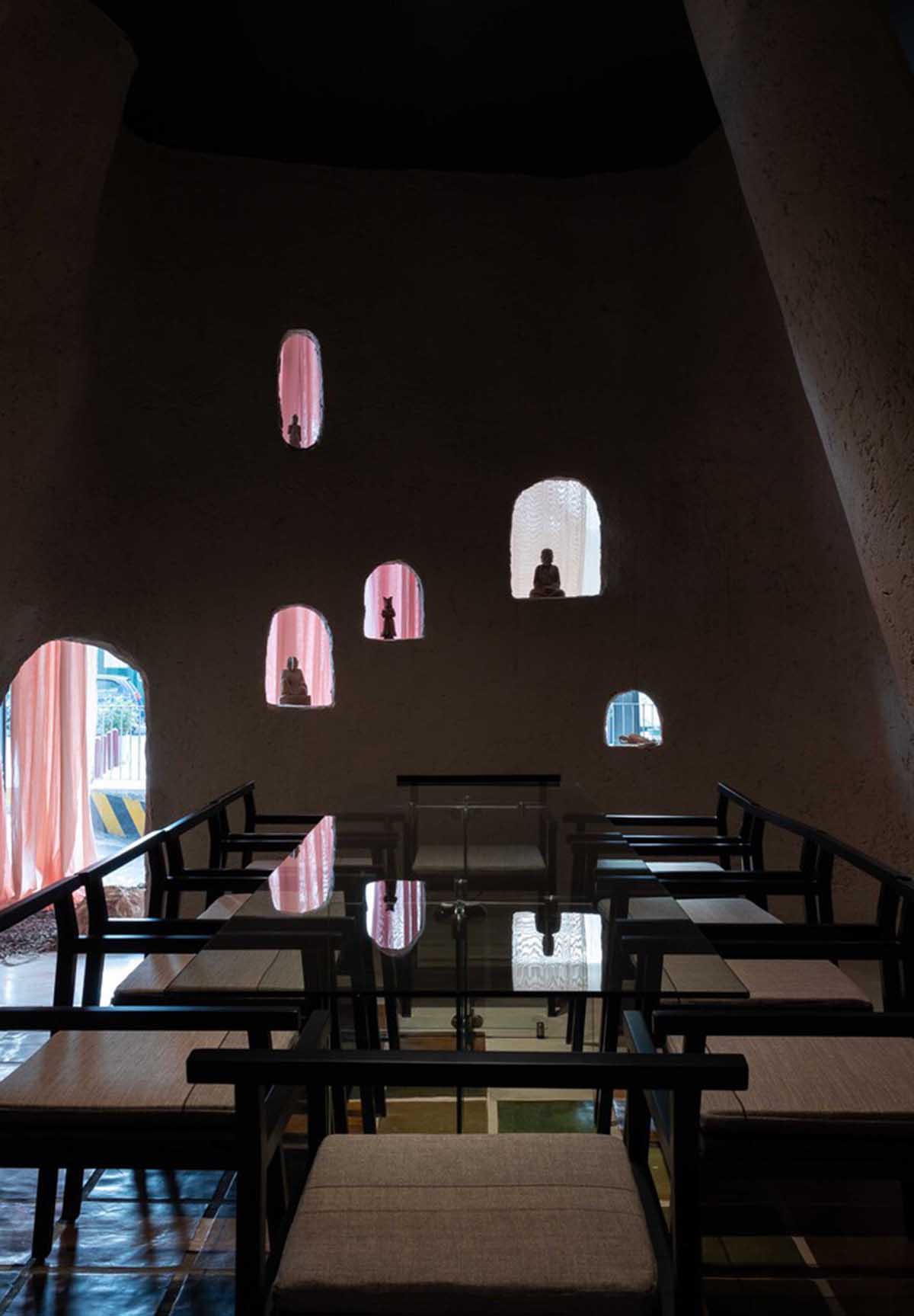 Vegetarian restaurant by Adrei Studio features moulded walls that become exhibition piece in Vietnam 