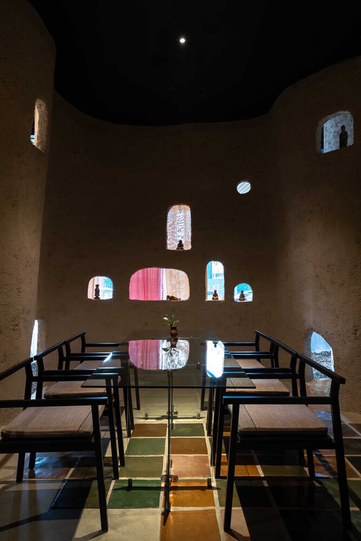 Vegetarian restaurant by Adrei Studio features moulded walls that become exhibition piece in Vietnam 