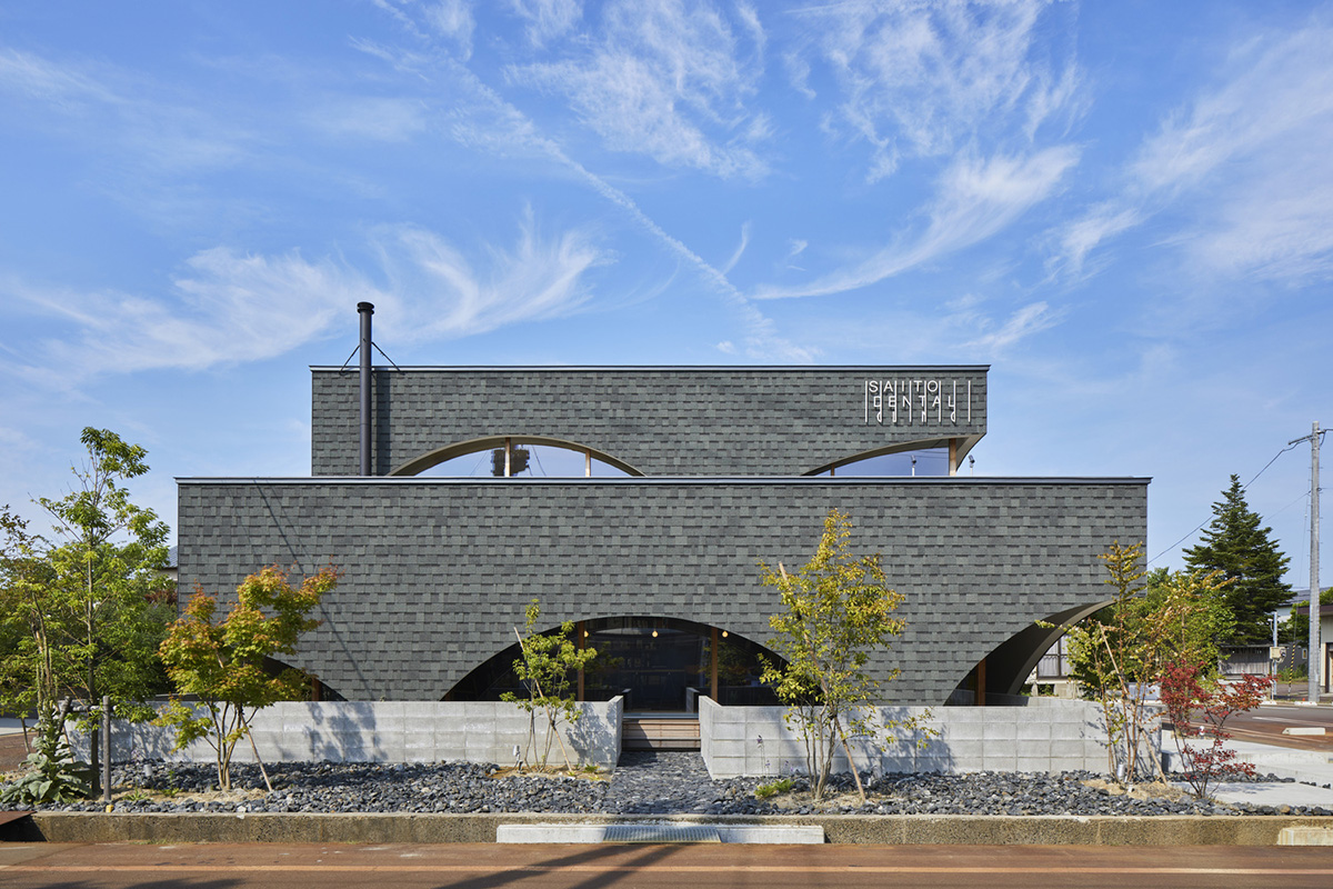 A dental clinic and daycare center are hidden under arches