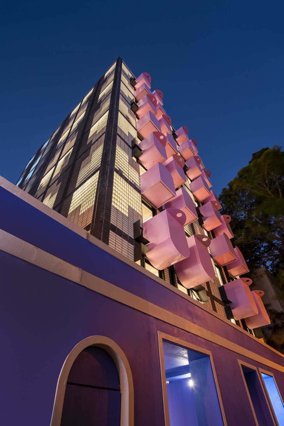 Two Five Five Architects adds protruding bright pink marshmallow balconies to apartment in Cape Town