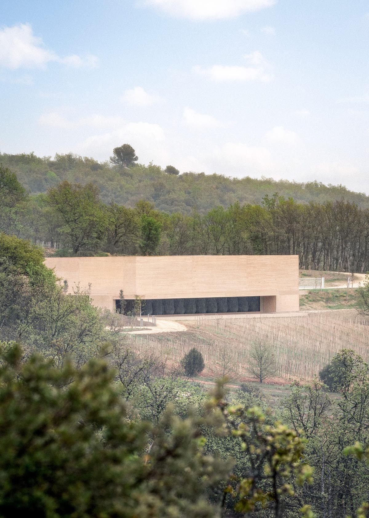 Atelier Marc Barani completes earth-toned winery overlooking vineyards in Ménerbes, France