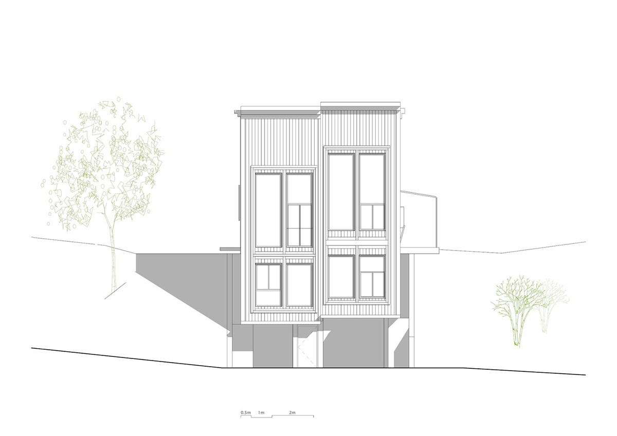 High windows allow users to get well-lit living spaces for this house by Rever & Drage Architects