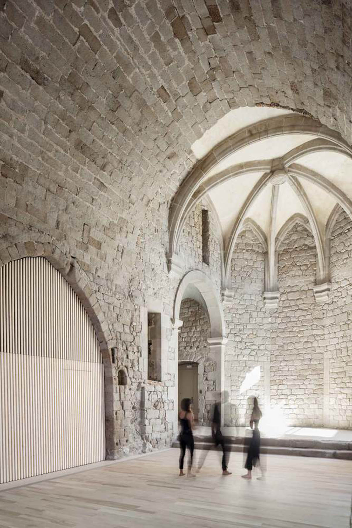 Carles Enrich Studio converts old church into performing arts centre in Spain