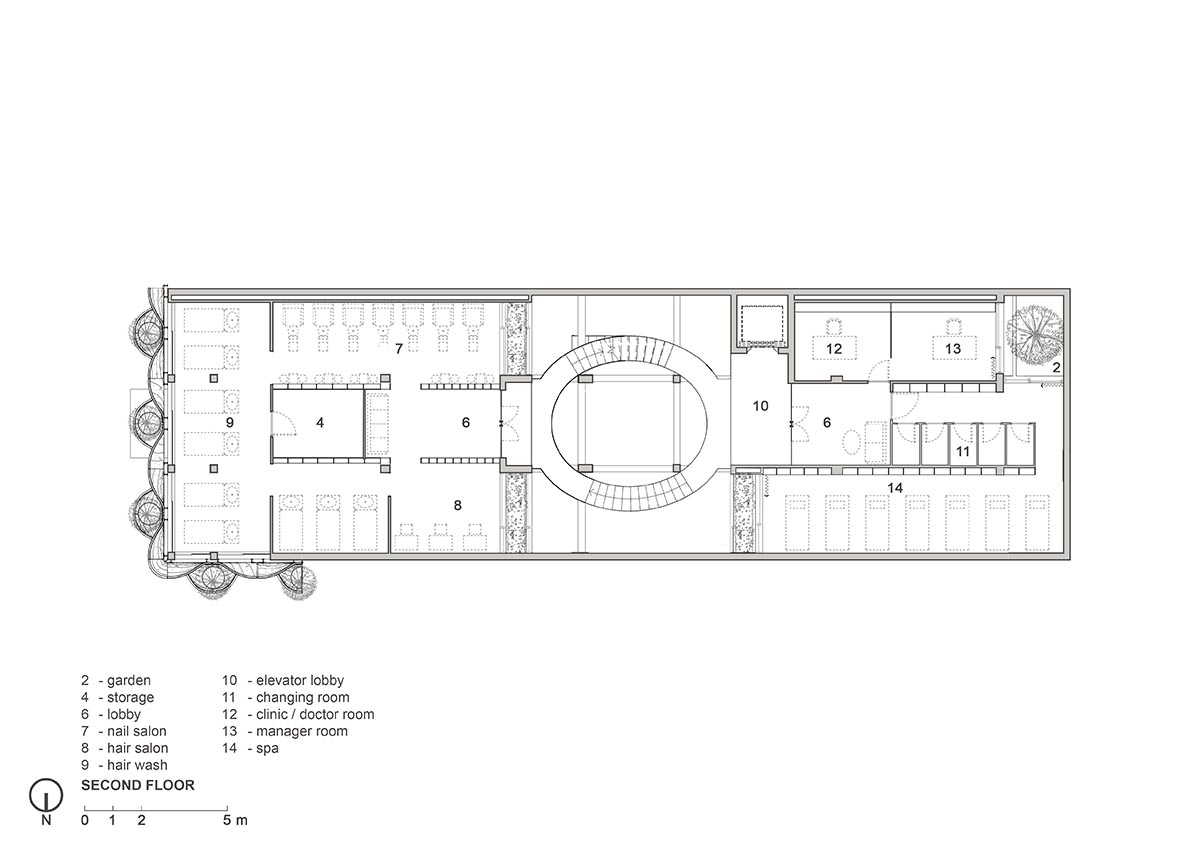 SAVA designs showroom wrapped by bulbous-formed planters on façade in Vietnam 