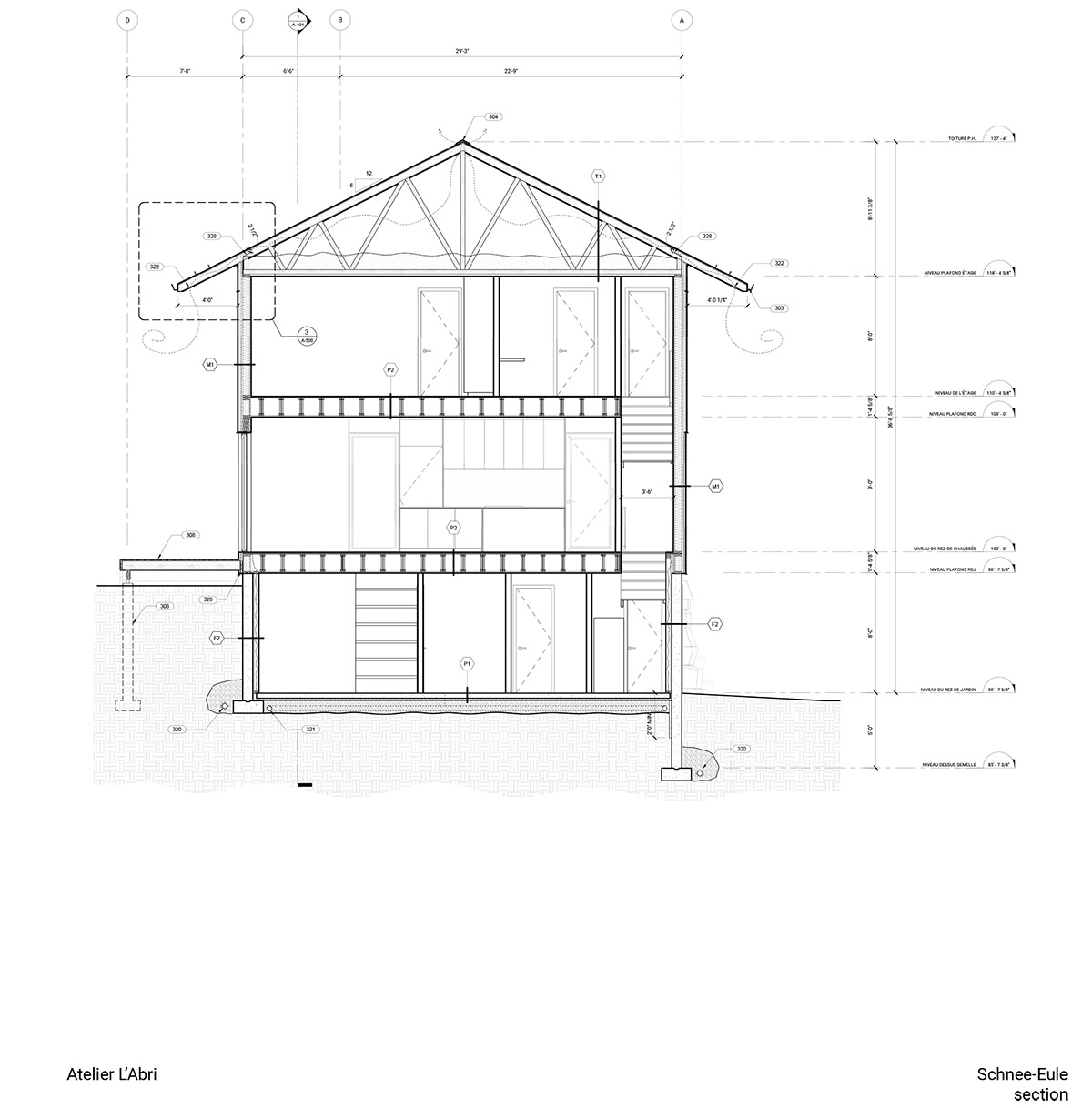 Canadian winter home designed by Atelier L'Abri looks like it is covered in  snow in