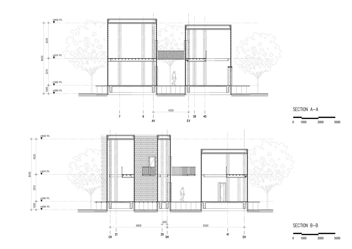 Five glass blocks with framed wood form this woman restaurant designed by Bangkok Project Studio