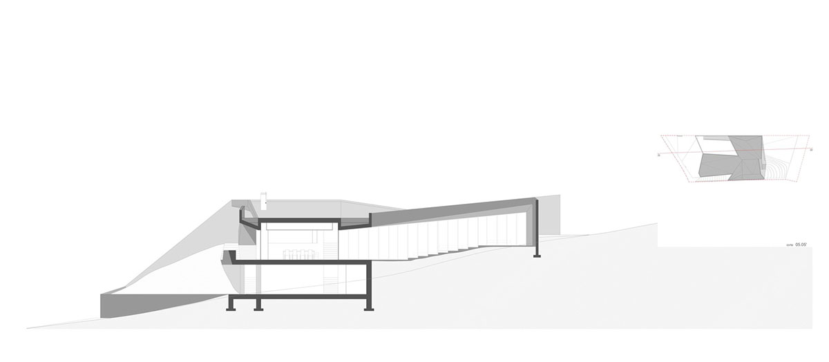 Contaminar Arquitectos built cave-like house from irregular walls inspired by rocky topography