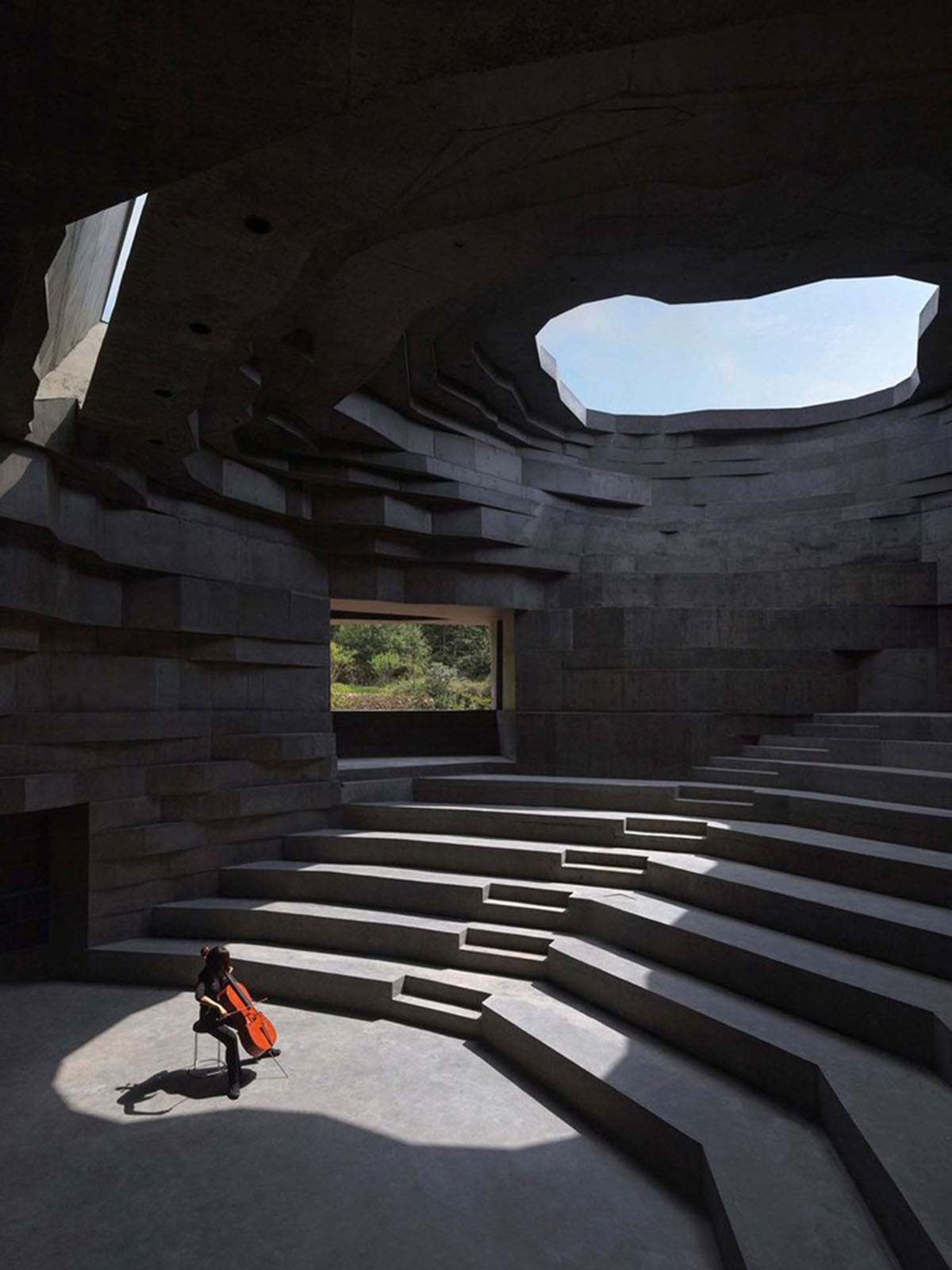 OPEN Architecture designs monolithic rock-like open-air concert hall in the north of Beijing
