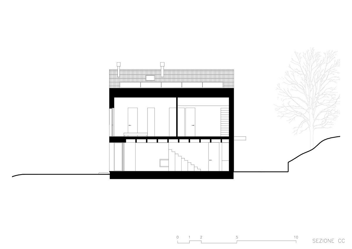 LADO architetti transforms 1970s house into a clean, monochromatic volume in Italy