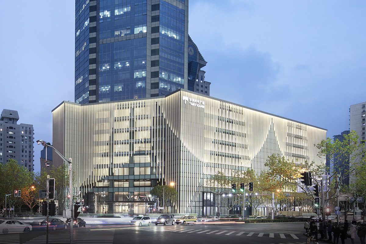 Nendo revives old Shanghai Times Square with aluminum screen that percolates on the facade