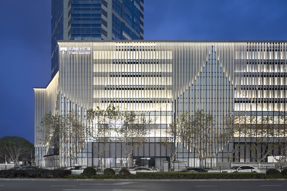 Nendo revives old Shanghai Times Square with aluminum screen that percolates on the facade