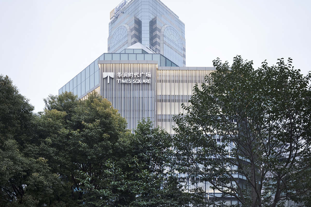Nendo revives old Shanghai Times Square with aluminum screen that percolates on the facade