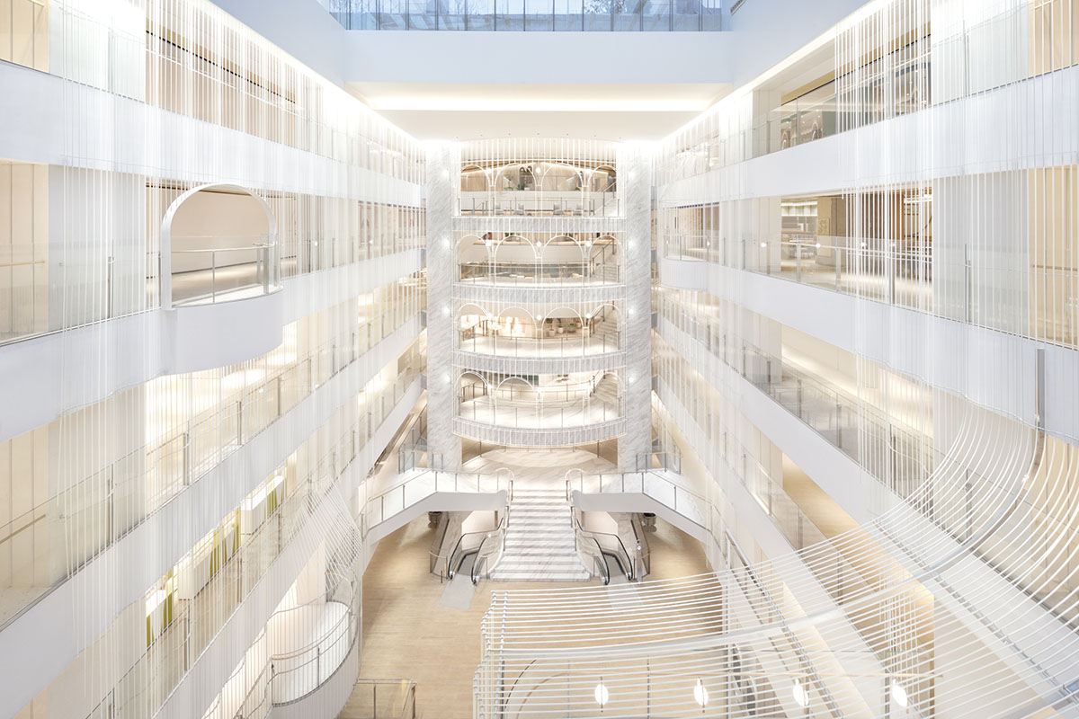 Nendo revives old Shanghai Times Square with aluminum screen that percolates on the facade