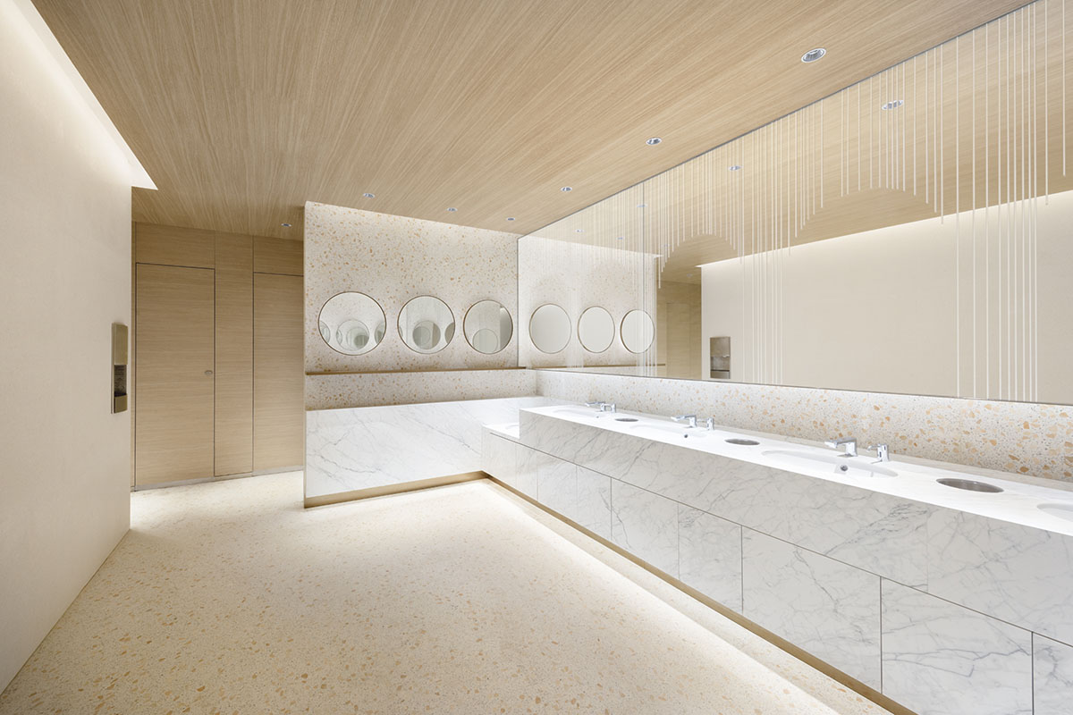 Nendo revives old Shanghai Times Square with aluminum screen that percolates on the facade