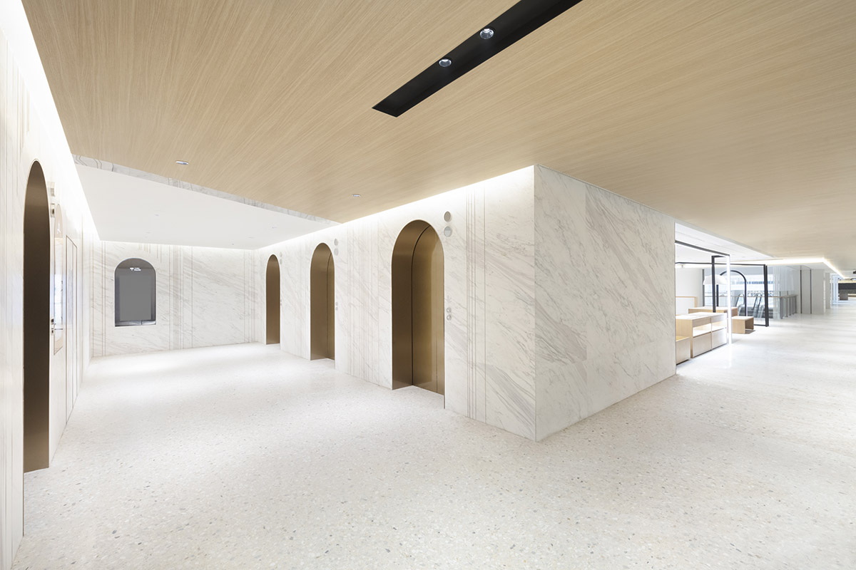 Nendo revives old Shanghai Times Square with aluminum screen that percolates on the facade