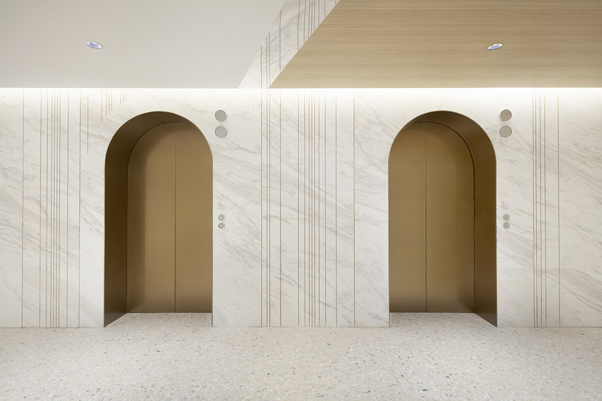 Nendo revives old Shanghai Times Square with aluminum screen that percolates on the facade