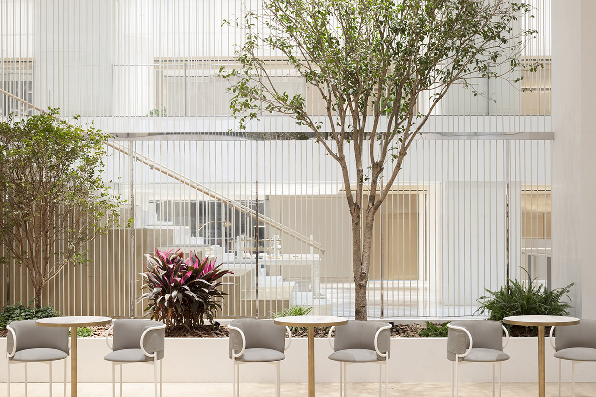 Nendo revives old Shanghai Times Square with aluminum screen that percolates on the facade