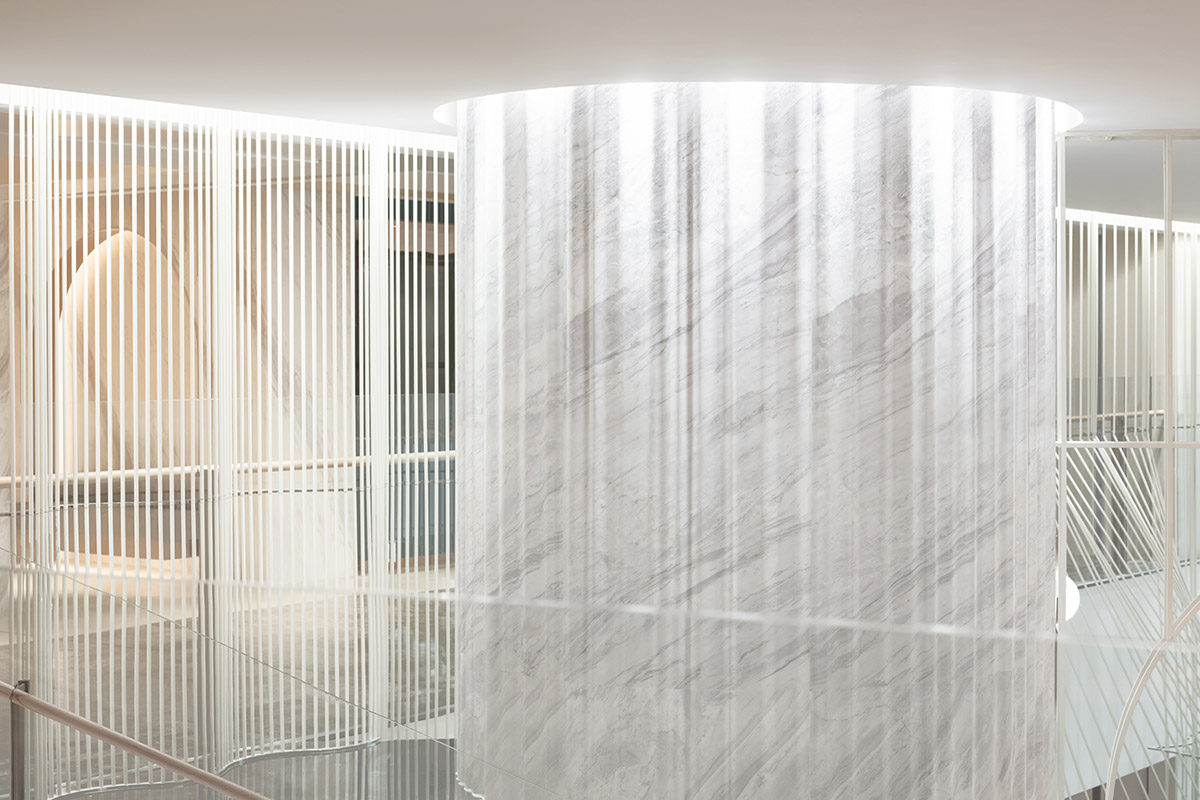 Nendo revives old Shanghai Times Square with aluminum screen that percolates on the facade