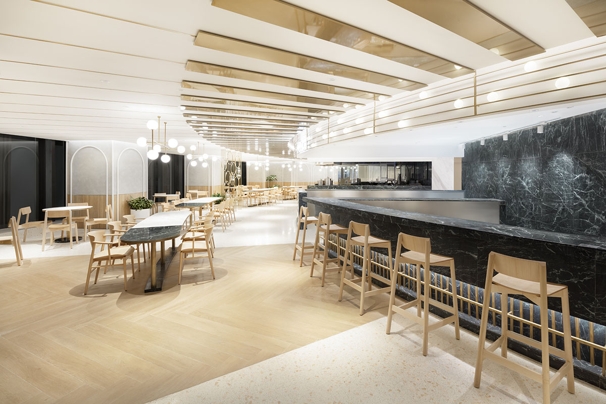 Nendo revives old Shanghai Times Square with aluminum screen that percolates on the facade