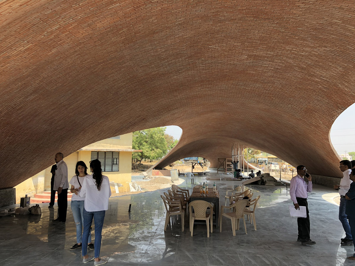 Sameep Padora & Associates built this children's library with curved brick roof in Maharashtra