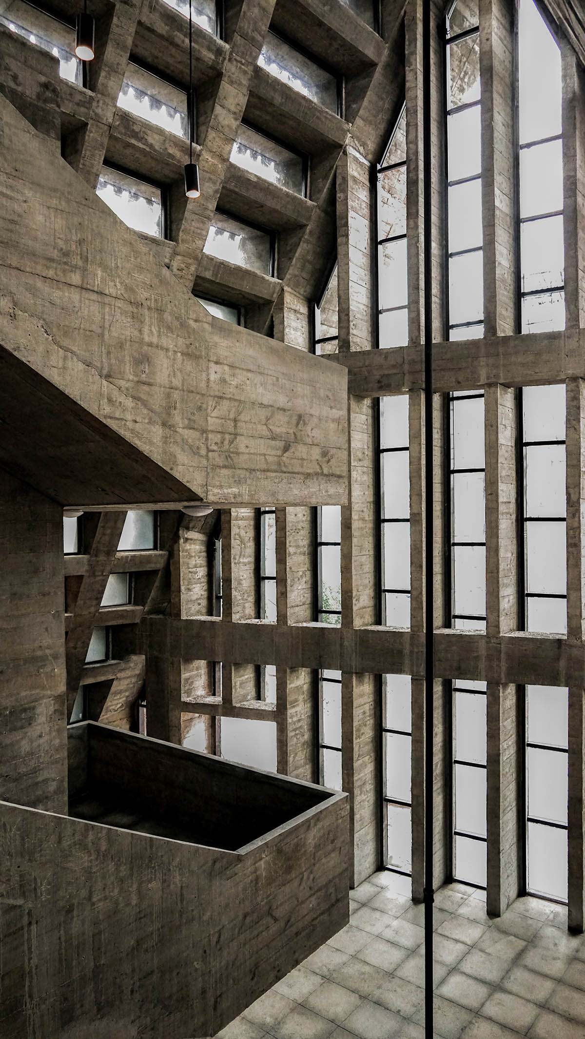 Three heavy concrete structures are inspired by Shui language and character of mountains in China