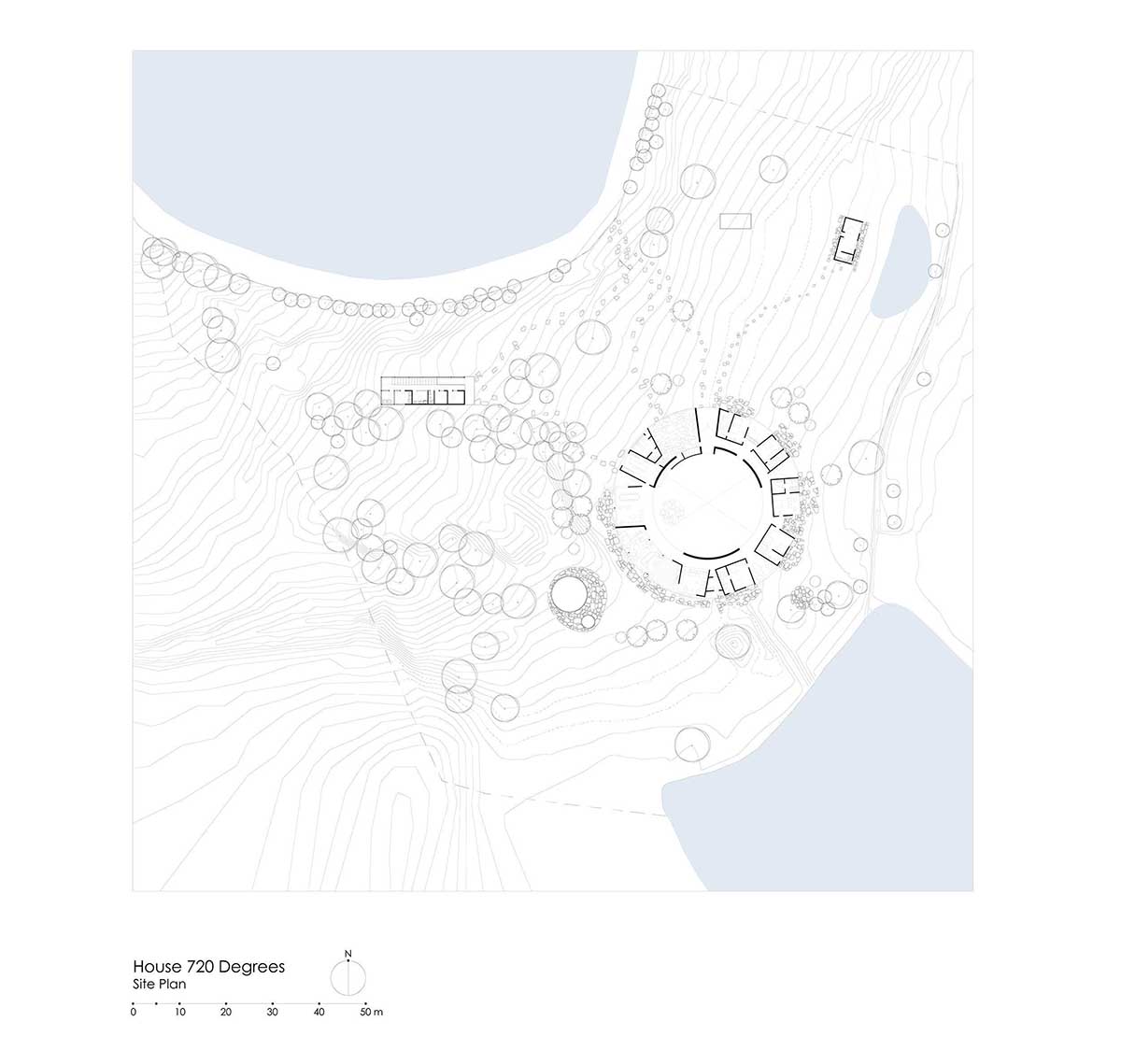 Fernanda Canales creates a circular home framing a mountain and a volcano in Mexico