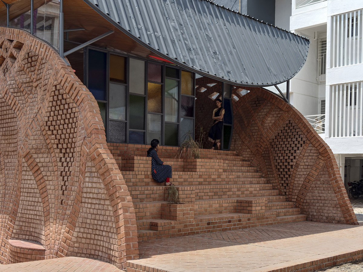 PMA madhushala's community center features undulating and artistic brick walls in Pune
