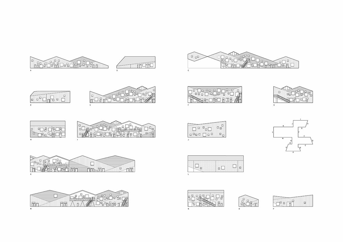 Human-scaled Primary School by CEBRA features pitched roofs with ...