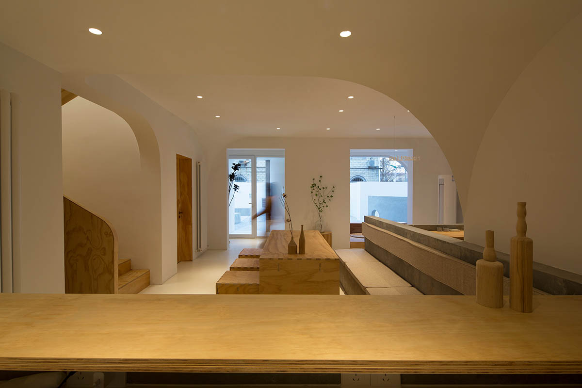 Boutique hotel by Atelier d'More is shaped by flowing curves and sculptural geometric compositions