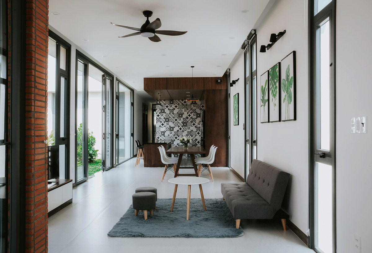 90odesign built this small house with brick walls as a shield of the house in Ho Chi Minh city