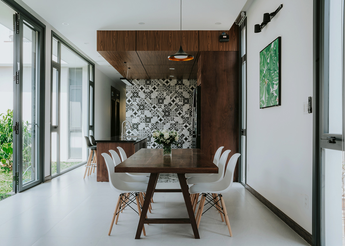 90odesign built this small house with brick walls as a shield of the house in Ho Chi Minh city