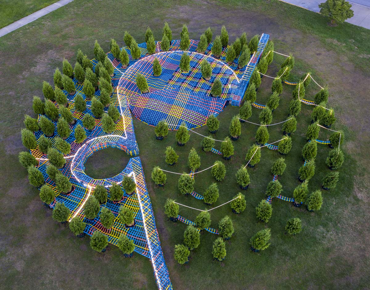 SO-IL wraps living trees with a hand-made nylon webbing in Columbus