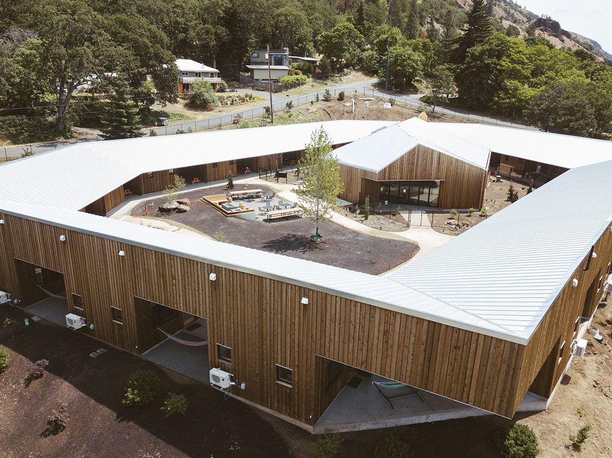 Waechter Architecture converts old school into a rustic hotel in Bingen by keeping its original feel