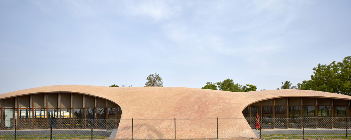 Sameep Padora & Associates built this children's library with curved brick roof in Maharashtra