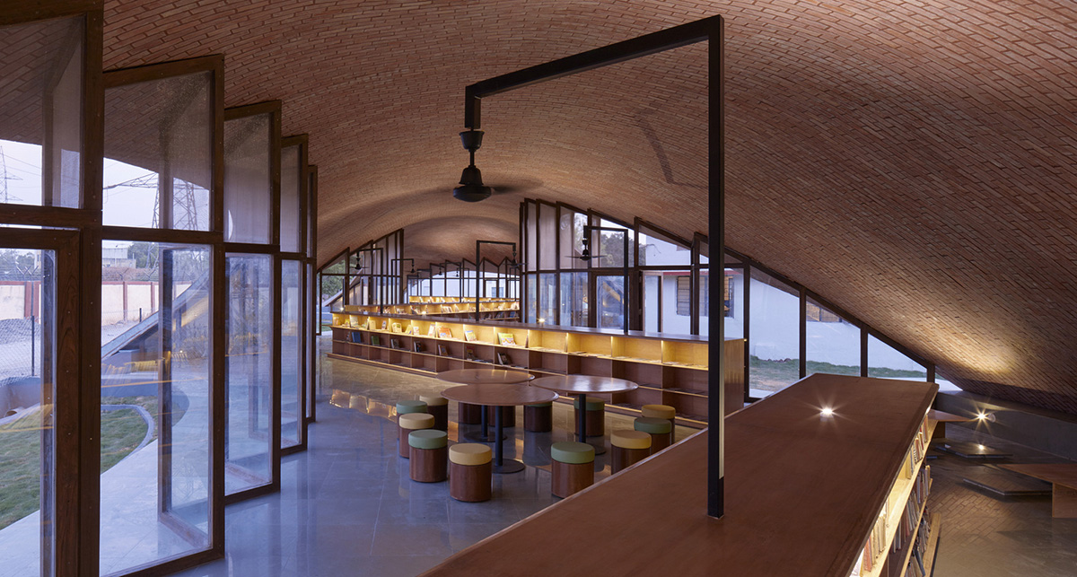 Sameep Padora & Associates built this children's library with curved brick roof in Maharashtra