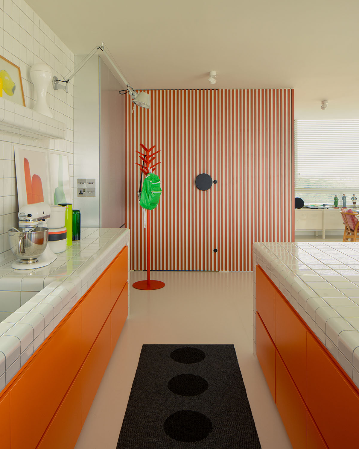 SPARK redesigns brutalist apartment with geometric and colorful objects in Singapore