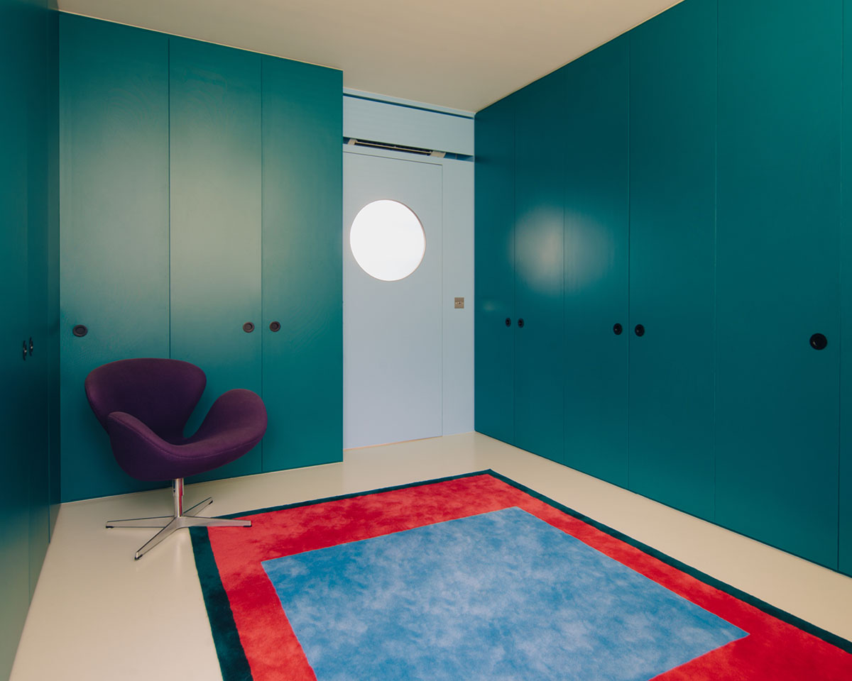 SPARK redesigns brutalist apartment with geometric and colorful objects in Singapore