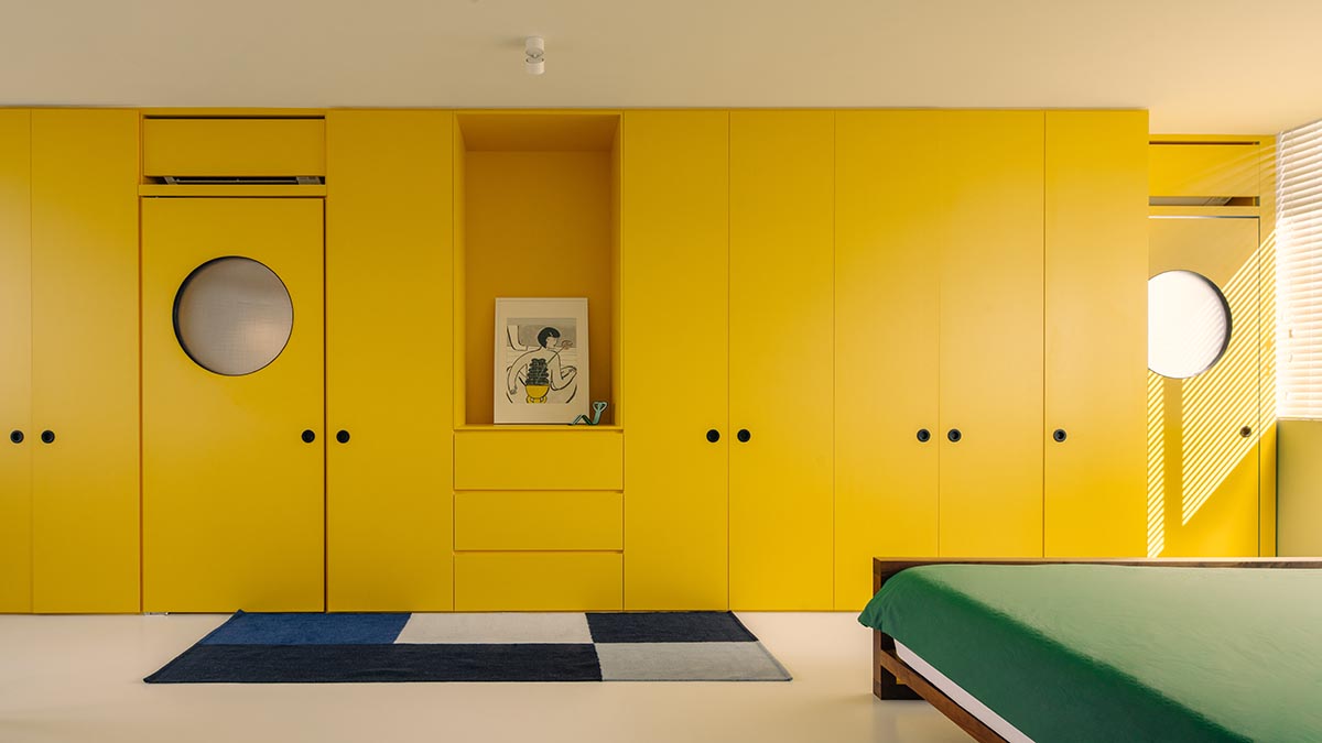 SPARK redesigns brutalist apartment with geometric and colorful objects in Singapore